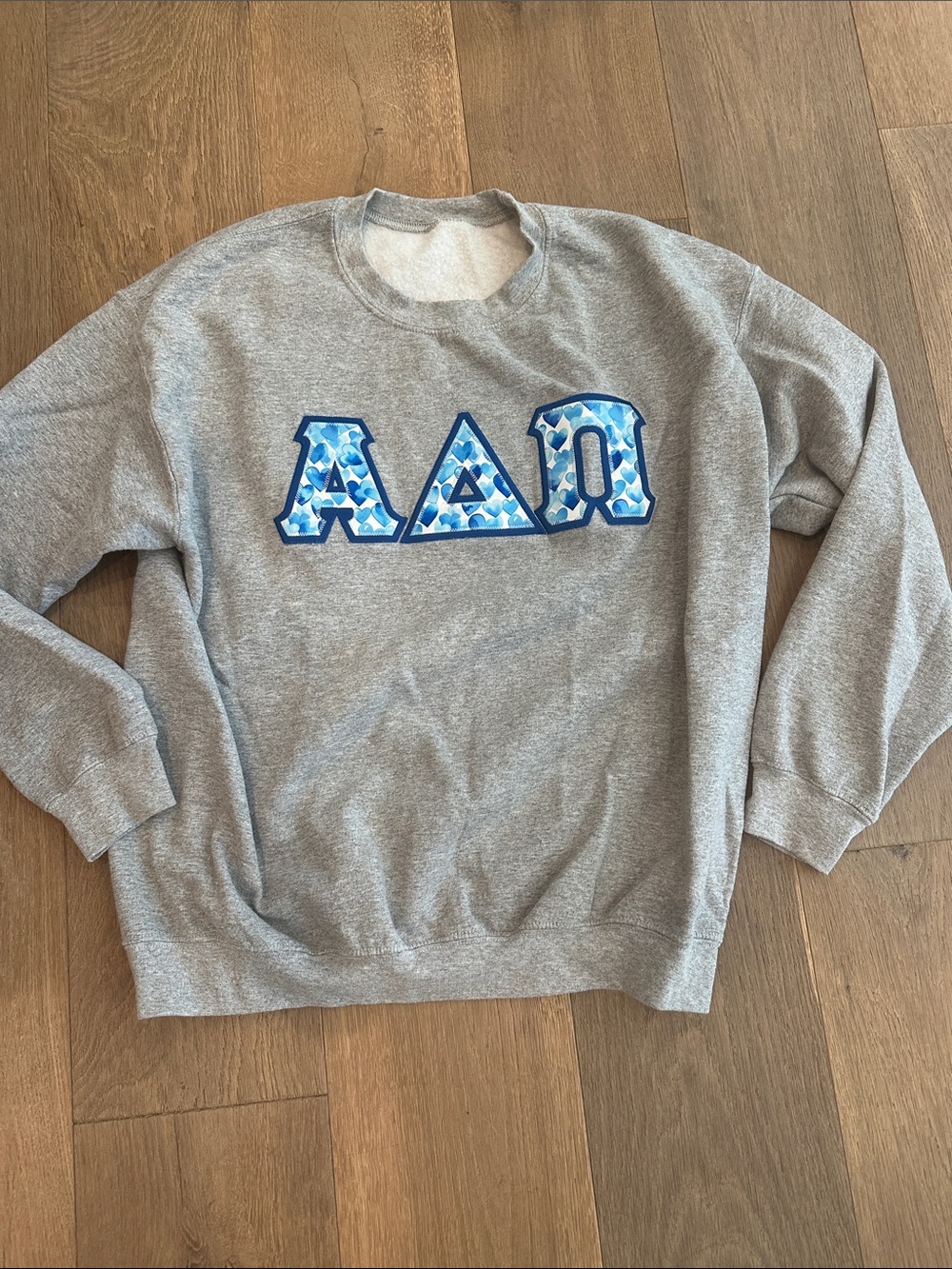 Alpha Delta Pi Gray Crewneck Sweater with Blue Heart Lettering